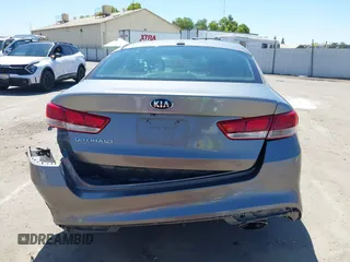 2016 Kia Optima LX with VIN 5XXGT4L36GG098804, listed as a IAAI auction lot 42772231 with 206,471 mi miles and . Bid and sale history available at DreamBid. Image 17.