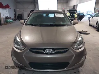 2013 Hyundai Accent SE with VIN KMHCU5AE6DU097353, listed as a IAAI auction lot 41937225 with 173,447 mi miles. Bid and sale history available at carsss.com. Image 12.