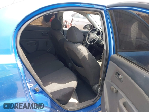2008 Kia Rio LX with VIN KNADE123886374992, listed as a IAAI auction lot 42027536 with 129,916 mi miles and . Bid and sale history available at DreamBid. Image 8.