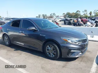 2019 Kia Optima LX z VIN 5XXGT4L38KG321756, wystawiony jako IAAI lot #42722406 z przebiegiem 97 164 mil mil oraz . Historia ofert i sprzedaży dostępna na DreamBid. Obrazek 1.