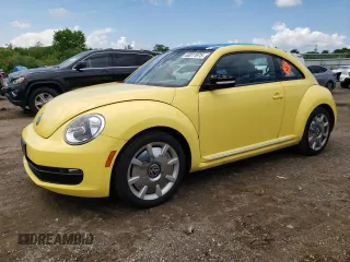 2013 Volkswagen Beetle 2.5L w/Sun with VIN 3VWJP7AT7DM600516, listed as a Copart auction lot 63011975 with 72,961 mi miles and Salvage title. Bid and sale history available at DreamBid. Image 1.