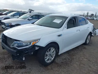 2017 Kia Optima LX with VIN 5XXGT4L37HG166481, listed as a IAAI auction lot 42248792 with 108,319 mi miles and . Bid and sale history available at DreamBid. Image 2.