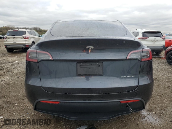 2024 Tesla Model Y Long Range z VIN 7SAYGDEE3RF087162, wystawiony jako Copart lot #79315224 z przebiegiem 3 232 mil mil oraz Szkoda całkowita • Salvage title. Historia ofert i sprzedaży dostępna na DreamBid. Obrazek 6.