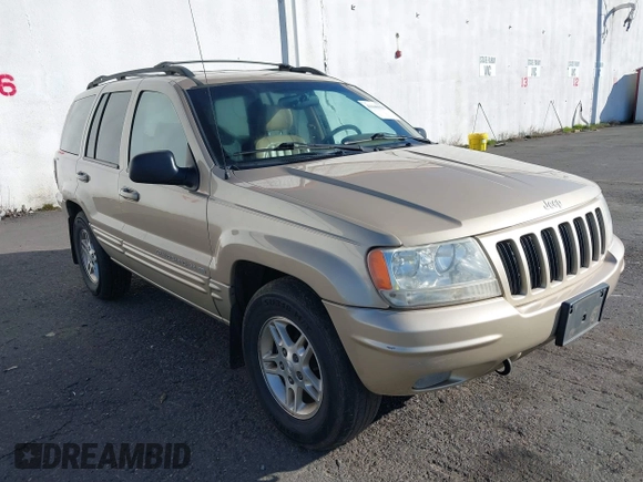 1999 Jeep Grand Cherokee Limited with VIN 1J4GW68N3XC688112, listed as a IAAI auction lot 41640033 with 196,851 mi miles. Bid and sale history available at carsss.com. Image 1.