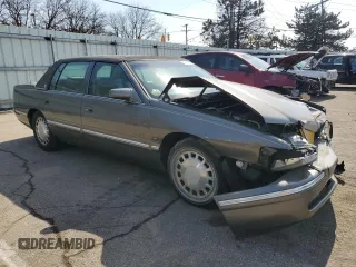 1998 Cadillac DeVille with VIN 1G6KD54Y4WU789008, listed as a Copart auction lot 48791445 with 58,335 mi miles and Salvage Title. Bid and sale history available at carsss.com. Image 4.