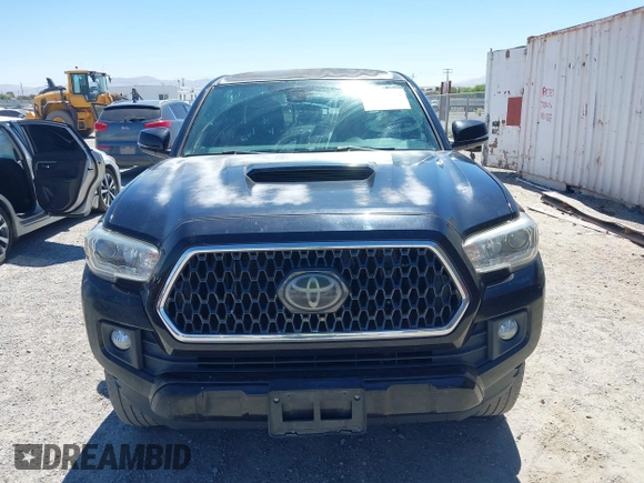 2018 Toyota Tacoma SR5 with VIN 3TMBZ5DN1JM014540, listed as a IAAI auction lot 42505324 with 112,990 mi miles and . Bid and sale history available at DreamBid. Image 12.