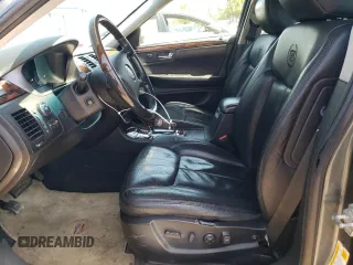 2011 Cadillac DTS Premium Collection z VIN 1G6KH5E64BU116540, wystawiony jako Copart lot #55257305 z przebiegiem 108 360 mil mil oraz Szkoda całkowita • Salvage title. Historia ofert i sprzedaży dostępna na DreamBid. Obrazek 7.
