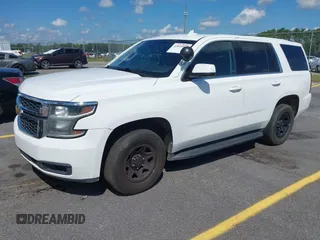 2018 Chevrolet Tahoe Commercial z VIN 1GNLCDEC1JR155210, wystawiony jako IAAI lot #42845068 z przebiegiem 159 456 mil mil oraz . Historia ofert i sprzedaży dostępna na DreamBid. Obrazek 2.