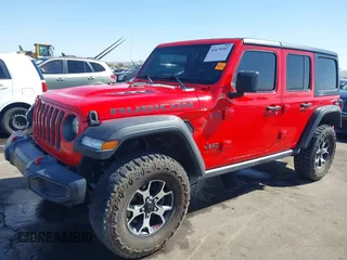 2020 Jeep Wrangler Unlimited Rubicon with VIN 1C4HJXFG2LW214874, listed as a IAAI auction lot 41679397 with 66,294 mi miles and . Bid and sale history available at DreamBid. Image 2.