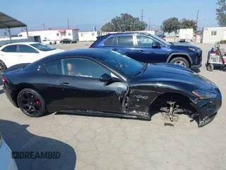2009 Maserati GranTurismo с VIN ZAMHJ45A590045064, выставлен на аукционе IAAI как лот 42427689 с пробегом 57 113 миль миль и . История ставок и продаж доступна на DreamBid. Изображение 14.