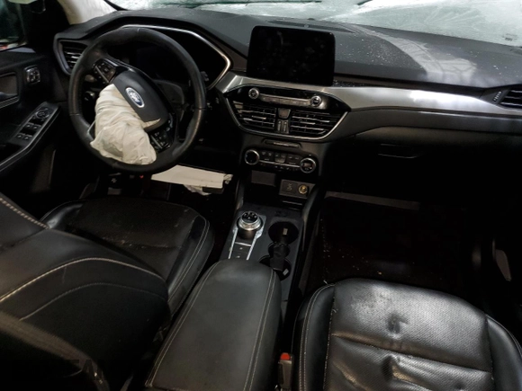 2021 Ford Escape Titanium with VIN 1FMCU9J91MUA57451, listed as a Copart auction lot 44678135 with 74,795 mi miles and Salvage title. Bid and sale history available at DreamBid. Image 8.