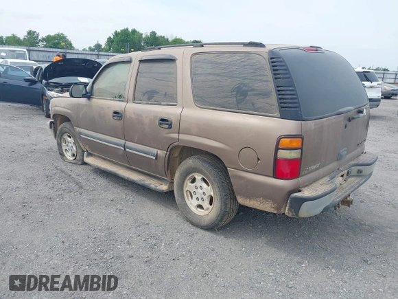 2004 Chevrolet Tahoe LT with VIN 1GNEC13Z04R126543, listed as a IAAI auction lot 42059836 with 252,773 mi miles. Bid and sale history available at carsss.com. Image 3.