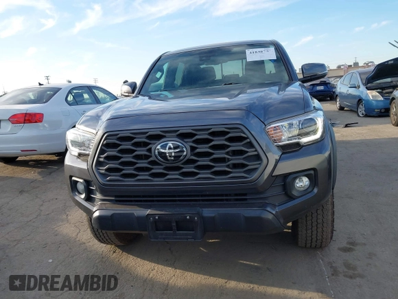 2021 Toyota Tacoma SR5 z VIN 3TMDZ5BN6MM110938, wystawiony jako IAAI lot #41838703 z przebiegiem 67 680 mil mil oraz . Historia ofert i sprzedaży dostępna na DreamBid. Obrazek 12.