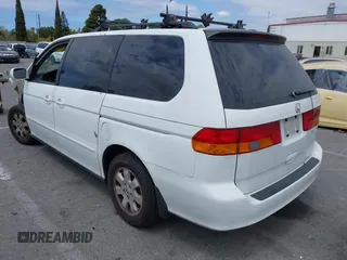 2003 Honda Odyssey EX-L with VIN 5FNRL18973B113215, listed as a IAAI auction lot 42052917 with Not Provided miles and . Bid and sale history available at DreamBid. Image 3.
