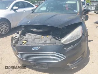 2015 Ford Focus Titanium with VIN 1FADP3J24FL385526, listed as a IAAI auction lot 42011712 with 162,696 mi miles and . Bid and sale history available at carsss.com. Image 6.