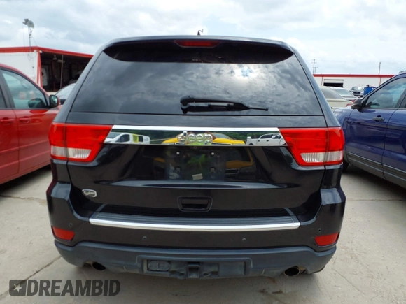 2013 Jeep Grand Cherokee Overland with VIN 1C4RJECT2DC588124, listed as a IAAI auction lot 42142573 with 204,309 mi miles and . Bid and sale history available at DreamBid. Image 16.