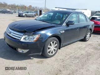 2008 Ford Taurus SEL with VIN 1FAHP24W48G131630, listed as a IAAI auction lot 42042813 with 86,855 mi miles. Bid and sale history available at carsss.com. Image 2.