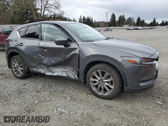 2020 Mazda CX-5 Grand Touring with VIN JM3KFBDM6L0815735, listed as a Copart auction lot 49511855 with 35,512 mi miles and Salvage Title. Bid and sale history available at carsss.com. Image 4.
