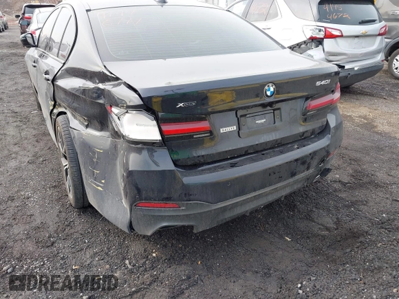 2021 BMW 5 Series 540i xDrive with VIN WBA73BJ07MWW98297, listed as a IAAI auction lot 41476777 with 47,693 mi miles and . Bid and sale history available at DreamBid. Image 19.