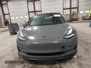 2018 Tesla Model 3 Long Range Battery with VIN 5YJ3E1EB8JF113566, listed as a IAAI auction lot 41726484 with 91,255 mi miles and . Bid and sale history available at DreamBid. Image 12.