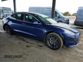 2020 Tesla Model 3 Standard Range Plus with VIN 5YJ3E1EA1LF631139, listed as a Copart auction lot 49161805 with 58,140 mi miles and Salvage Title. Bid and sale history available at DreamBid. Image 4.