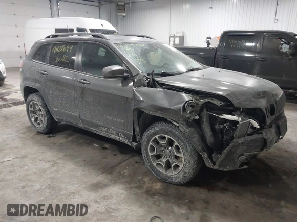 2021 Jeep Cherokee Trailhawk z VIN 1C4PJMBX4MD148597, wystawiony jako IAAI lot #41622099 z przebiegiem 48 452 mil mil oraz . Historia ofert i sprzedaży dostępna na DreamBid. Obrazek 1.