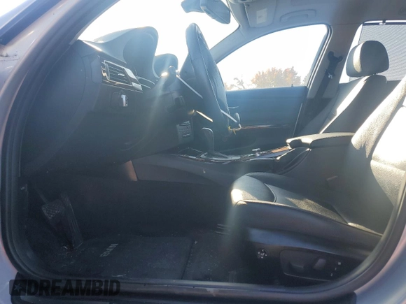 2012 BMW 3 Series 328i xDrive with VIN WBAUU3C53CA543482, listed as a Copart auction lot 77783264 with 68,931 mi miles and Salvage Title. Bid and sale history available at DreamBid. Image 7.