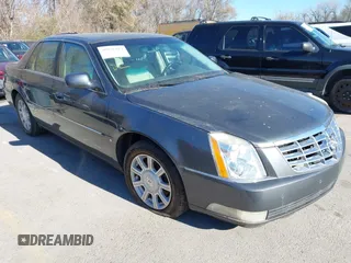 2009 Cadillac DTS 1SA z VIN 1G6KD57Y89U128646, wystawiony jako IAAI lot #40976417 z przebiegiem 167 346 mil mil oraz . Historia ofert i sprzedaży dostępna na DreamBid. Obrazek 1.