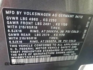 2012 Volkswagen Tiguan S z VIN WVGBV7AX3CW088330, wystawiony jako Copart lot #76722704 z przebiegiem 107 018 mil mil oraz Nie do naprawy • Non repairable. Historia ofert i sprzedaży dostępna na DreamBid. Obrazek 14.