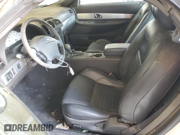 2002 Ford Thunderbird Hardtop Premium z VIN 1FAHP60A52Y130277, wystawiony jako Copart lot #69473594 z przebiegiem Nie podano mil oraz Szkoda całkowita • Salvage title. Historia ofert i sprzedaży dostępna na DreamBid. Obrazek 7.