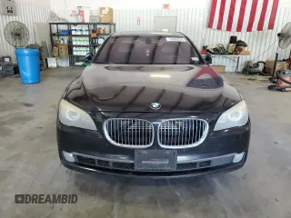 2011 BMW 7 Series with VIN WBAKX6C50BC197118, listed as a Copart auction lot 73686234 with 166,393 mi miles and Clean title. Bid and sale history available at DreamBid. Image 5.