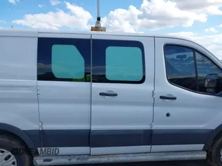 2015 Ford Transit Cargo z VIN 1FTNR1ZM3FKB02963, wystawiony jako IAAI lot #42231167 z przebiegiem 181 270 mil mil oraz . Historia ofert i sprzedaży dostępna na DreamBid. Obrazek 13.