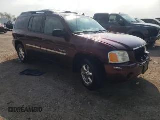 2006 GMC Envoy SLE with VIN 1GKET16S766125647, listed as a Copart auction lot 74894724 with 162,905 mi miles and Salvage Title. Bid and sale history available at DreamBid. Image 4.