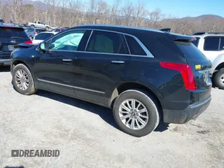 2018 Cadillac XT5 FWD with VIN 1GYKNARS5JZ235585, listed as a IAAI auction lot 41607440 with 77,220 mi miles and . Bid and sale history available at DreamBid. Image 3.