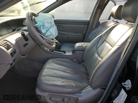 2001 Toyota Avalon XL z VIN 4T1BF28B61U175674, wystawiony jako Copart lot #49913765 z przebiegiem 170 245 mil mil oraz Tytuł czysty. Historia ofert i sprzedaży dostępna na DreamBid. Obrazek 7.