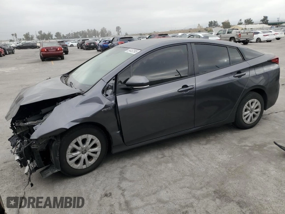 2021 Toyota Prius L Eco with VIN JTDKAMFU8M3130779, listed as a Copart auction lot 56452395 with 86,094 mi miles and Salvage title. Bid and sale history available at DreamBid. Image 1.