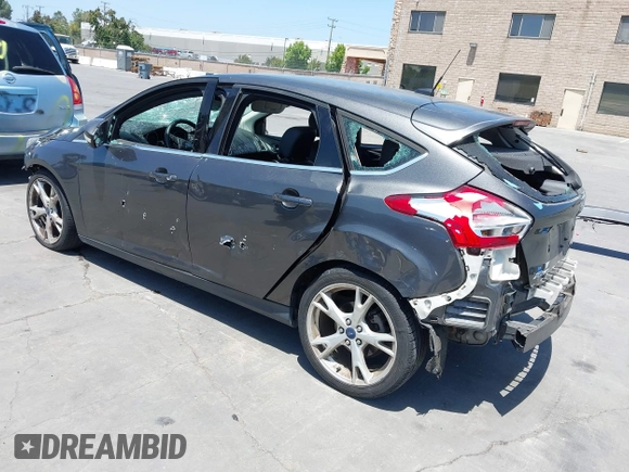 2015 Ford Focus Titanium with VIN 1FADP3N27FL380525, listed as a IAAI auction lot 42493542 with 86,423 mi miles and . Bid and sale history available at DreamBid. Image 3.