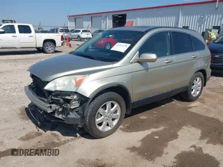 2007 Honda CR-V EX-L z VIN JHLRE387X7C038133, wystawiony jako IAAI lot #42341678 z przebiegiem 204 857 mil mil oraz . Historia ofert i sprzedaży dostępna na DreamBid. Obrazek 2.