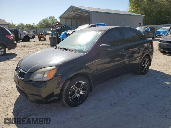 2011 Kia Rio LX with VIN KNADH4A31B6749736, listed as a Copart auction lot 53128685 with 103,392 mi miles and Clean Title. Bid and sale history available at carsss.com. Image 1.