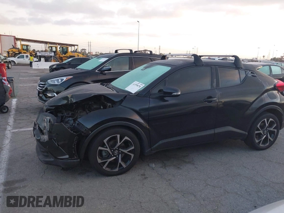 2019 Toyota C-HR XLE with VIN JTNKHMBXXK1034717, listed as a IAAI auction lot 41939078 with 56,309 mi miles. Bid and sale history available at carsss.com. Image 15.