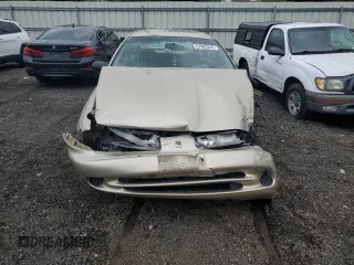 1997 Saturn SW z VIN 1G8ZK827XVZ120119, wystawiony jako Copart lot #57083245 z przebiegiem 199 971 mil mil oraz Szkody całkowita. Historia ofert i sprzedaży dostępna na DreamBid. Obrazek 5.