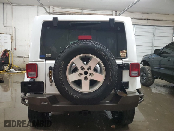 2017 Jeep Wrangler Unlimited Rubicon Recon with VIN 1C4HJWFG9HL543266, listed as a Copart auction lot 87771705 with 50,223 mi miles and Salvage title. Bid and sale history available at DreamBid. Image 6.