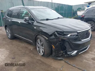 2020 Cadillac XT6 FWD Premium Luxury with VIN 1GYKPCRS6LZ148058, listed as a IAAI auction lot 42416949 with 79,318 mi miles and . Bid and sale history available at DreamBid. Image 1.