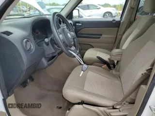 2014 Jeep Patriot Latitude with VIN 1C4NJRFB6ED726994, listed as a Copart auction lot 65746095 with 150,051 mi miles and Clean title. Bid and sale history available at DreamBid. Image 7.