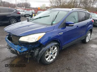 2014 Ford Escape Titanium with VIN 1FMCU9J99EUA46103, listed as a IAAI auction lot 42018097 with 169,878 mi miles and . Bid and sale history available at DreamBid. Image 19.