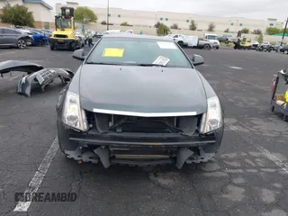 2011 Cadillac CTS Performance with VIN 1G6DJ1ED7B0126314, listed as a IAAI auction lot 42185363 with 80,676 mi miles and . Bid and sale history available at DreamBid. Image 6.