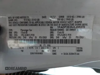 2018 Ford Focus S with VIN 1FADP3E26JL205370, listed as a IAAI auction lot 42083989 with 91,401 mi miles and . Bid and sale history available at DreamBid. Image 9.