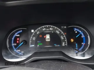 2021 Toyota RAV4 Hybrid XSE with VIN 2T3E6RFV4MW004081, listed as a IAAI auction lot 42300195 with 63,238 mi miles and . Bid and sale history available at DreamBid. Image 7.