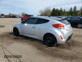 2013 Hyundai Veloster w/Black Int с VIN KMHTC6AD4DU139261, выставлен на аукционе Copart как лот 56175095 с пробегом 148 483 миль миль и Чистый • Clean title. История ставок и продаж доступна на DreamBid. Изображение 2.