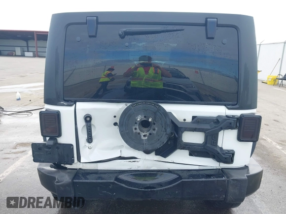 2013 Jeep Wrangler Unlimited Sport with VIN 1C4BJWDG4DL599151, listed as a IAAI auction lot 42212831 with 143,865 mi miles and . Bid and sale history available at DreamBid. Image 6.